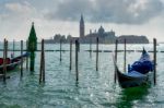 Gondolas Moored At The Entrance To The Grand Canal Stock Photo