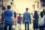 Blurred People Walking On The Street Of Old Town Stock Photo