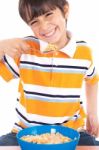 Young Boy Eating His Breakfast Stock Photo