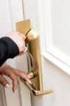 Woman Opening Door Lock With An Electronic Card Stock Photo