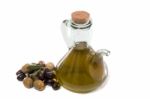 Green And Black Olives With Olive Oil Bottle Stock Photo