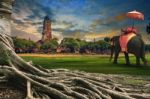 Big Root Of Banyan Tree And Kingdom Elephant Dressing Against Land Scape Of Ancient And Old  Pagoda In History Temple Of Ayuthaya World Heritage Sites Of Unesco Central Of Thailand Important Destination Of Tourist Stock Photo