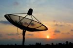 Satellite Dish And Colorful Sky Stock Photo