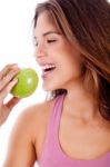 Happy Young Girl Ready To Bite A Green Apple Stock Photo