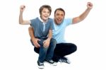 Joyous Father And Son Cheering Loud Stock Photo