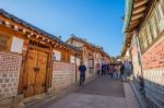 Seoul,korea - March 23: Tourists Taking Photos Of The Beautiful Scenery Around Bukchon Hanok Village,traditional Korean Style Architecture, Photo Taken March 23,2015 In Seoul, South Korea Stock Photo