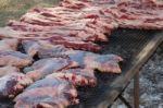 Traditional Meat Grilled On The Grill In The Argentine Countryside Stock Photo