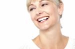 Closeup Shot Of A Beautiful Woman Smiling Heartily Stock Photo