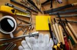 Tools Equipment With Coffee And Notepad On Wood Stock Photo