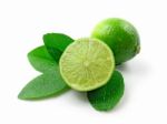 Green Limes With Leaves Stock Photo