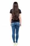 Back Pose Of Young Woman Stock Photo