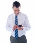 Businessman Reading Text Message Stock Photo