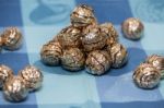 Pile Of Sweet Round Chocolate Candies Stock Photo