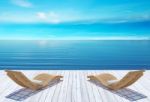 Beach Lounge, Sundeck Over Blue Sea And Sky, Summer Holiday Vacation Concept Stock Photo