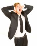 Standing Businessman Screaming Stock Photo