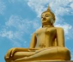 The Buddha Status On Blue Sky Background Stock Photo