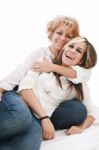 Mother And Daughter Sitting Stock Photo