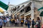 Tourists On The Rialto Bridge Venice Stock Photo