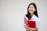 Asia Thai High School Student Uniform Beautiful Girl Read A Book Stock Photo