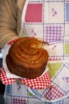 Holding A Folar Cake Stock Photo