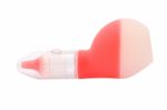 Side Of Nasal Aspirator With Cap On White Background Stock Photo