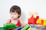 Adorable Little Girl With Present Stock Photo