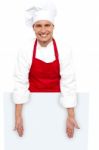 Male Chef Posing Behind Blank Board Stock Photo