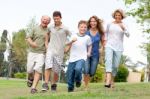 Happy Family Enjoying Outdoors Stock Photo