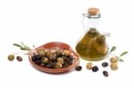 Green And Black Olives With Olive Oil Bottle Stock Photo