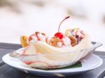 Banana Split Ice Cream With Whipped Cream And Cherry Stock Photo