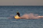 Man Riding A Jet Ski Off Dungeness Stock Photo