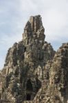 Ancient Stone Faces Of King Jayavarman Vii At The Bayon Temple, Stock Photo