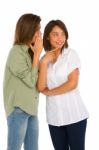 Teenage Girls Gossiping Stock Photo