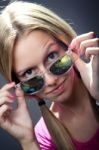 Happy Young  Woman With Sunglasses Looking At The Camera Stock Photo