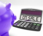 On Sale Calculator Shows Price Cut And Saving Stock Photo