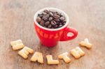 Healthy Alphabet Biscuit With Red Coffee Cup Stock Photo