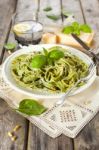 Homemade Spinach Pasta With Pesto And Parmesan Cheese Stock Photo