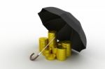 Gold Coins Under A Black Umbrella Stock Photo