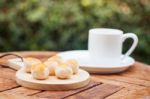 Mini Chinese Cakes On Wooden Plate Stock Photo