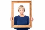 Sad Woman Holding Picture Frame Stock Photo