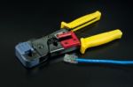 Crimping Tool For Twisted Pair On Black Background Stock Photo