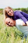 Embracing Lovely Lovers Having Fun Stock Photo