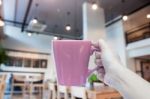 Woman Holding Coffee Cup With Abstract Blur Coffee Shop Stock Photo