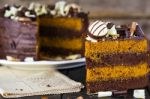 Slice Of Chocolate And Toffee Layer Cake Stock Photo