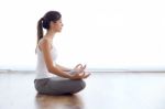 Beautiful Young Woman Doing Yoga Exercises At Home Stock Photo