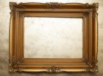 Old Picture Frame On Gold Wall Stock Photo