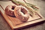 Bagels On Bread Board Stock Photo