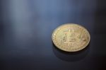 Bitcoin Curency Dof On Blue Light Background Stock Photo