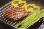 Grilled  Steak On Grill Pan Stock Photo