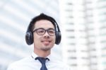 Portrait Of A Young Man Listening To Music Stock Photo